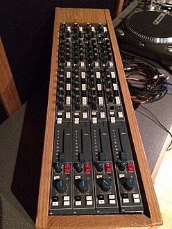 Click image for larger version  Name:	Neve-Console-8232-8248-Rack-enclosure-with.jpg Views:	0 Size:	28.2 KB ID:	932967