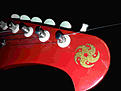 Click image for larger version

Name:	Red Guitar - Close-Up of Logo on Head #1 - Resized.jpg
Views:	1307
Size:	254.2 KB
ID:	869472